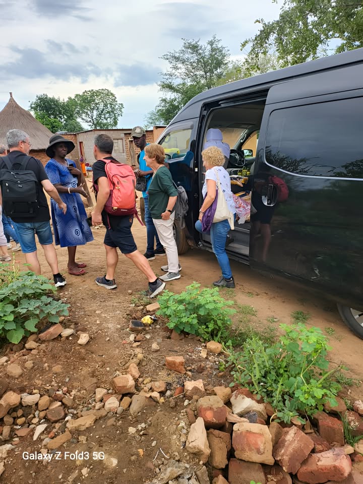 Guests on a cultural village tour
